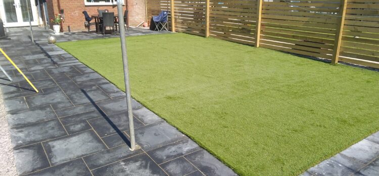 new patio slabs, artificial grass, new fencing