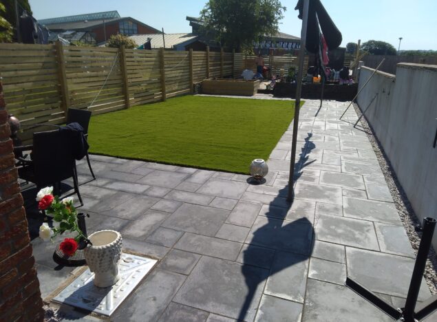 new patio slabs, artificial grass, new fencing